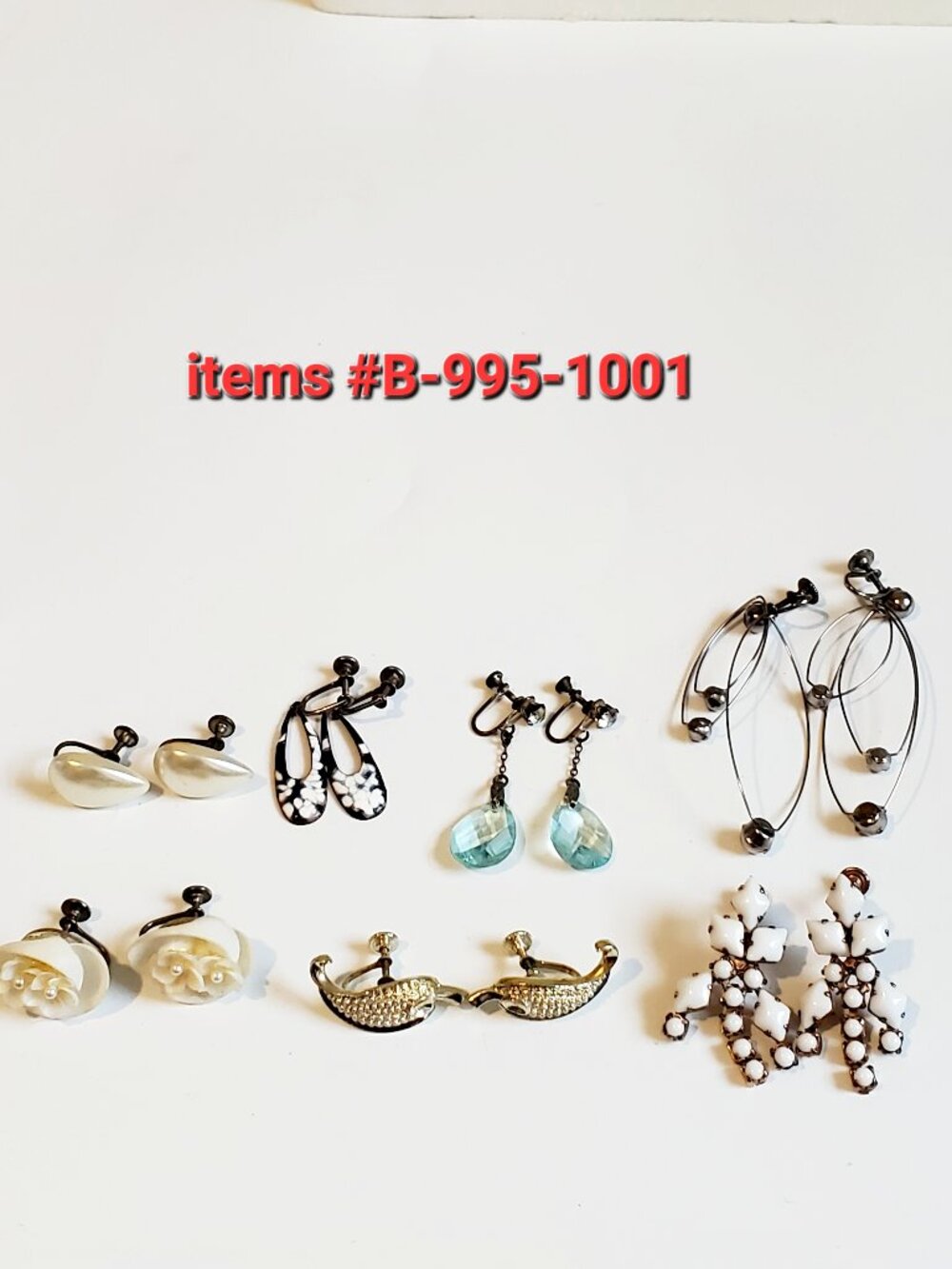 7 Pair of screw on Earrings, items # B -995-1001,. wt. 47 grams .